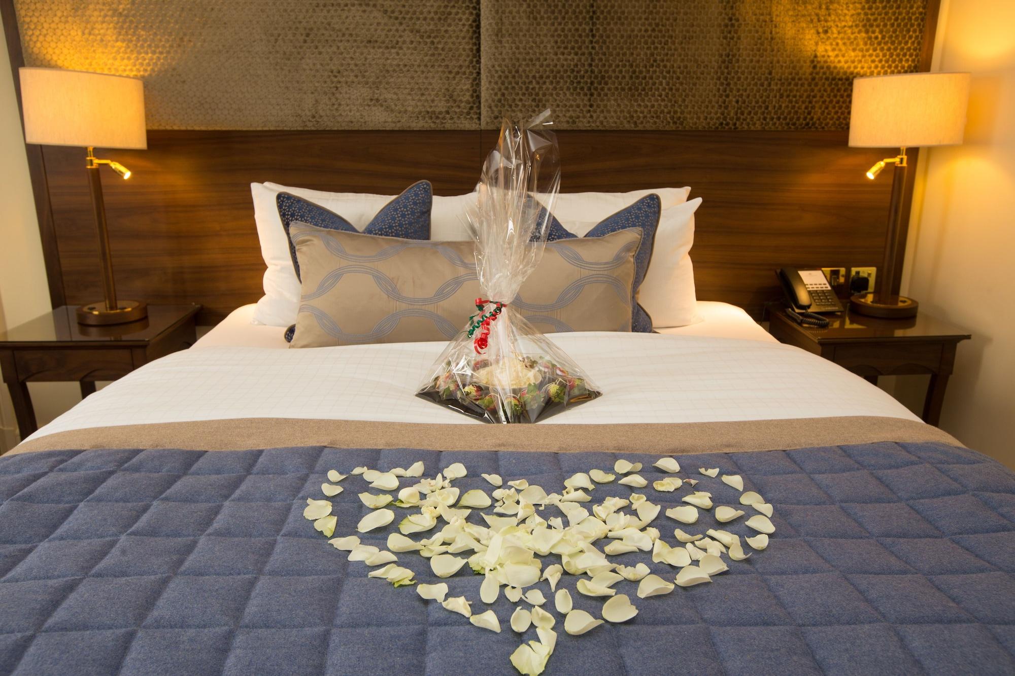 The Celtic Manor Resort Newport  Bagian luar foto A bed decorated for Valentine's Day